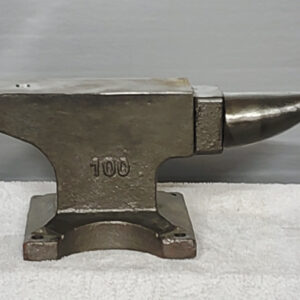 Front view of an anvil sitting on a white towel